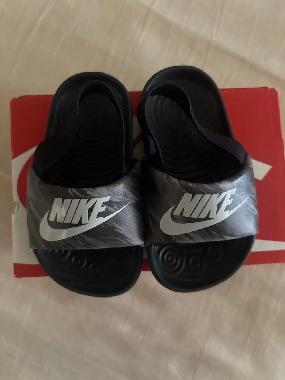 Nike Kids Black Slide Sandals with White Logo